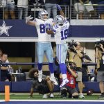 
              Dallas Cowboys tight end Dalton Schultz (86) and wide receiver Amari Cooper (19) celebrate a touchdown catch made by Schultz in the first half of an NFL football game against the Philadelphia Eagles in Arlington, Texas, Monday, Sept. 27, 2021. (AP Photo/Michael Ainsworth)
            