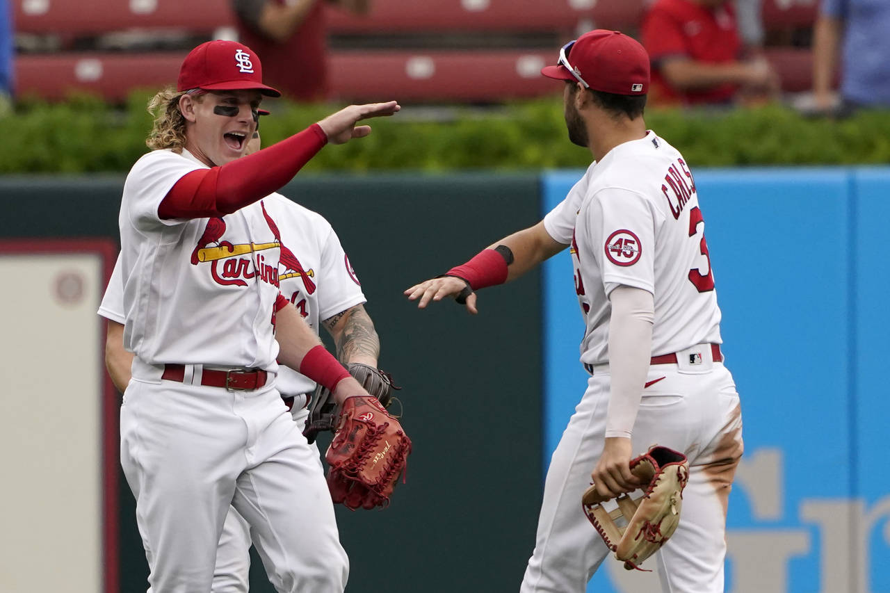 St. Louis Cardinals' Harrison Bader, left, and Dylan Carlson celebrate following a 4-3 victory over...