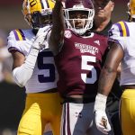 
              Mississippi State wide receiver Lideatrick Griffin (5) stands amid LSU defenders and gestures after catching a pass for a first down during the first half of an NCAA college football game, Saturday, Sept. 25, 2021, in Starkville, Miss. (AP Photo/Rogelio V. Solis)
            