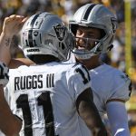 
              Las Vegas Raiders quarterback Derek Carr, right, celebrates a touchdown wide receiver Henry Ruggs III (11) during the second half of an NFL football game against the Pittsburgh Steelers in Pittsburgh, Sunday, Sept. 19, 2021. (AP Photo/Don Wright)
            