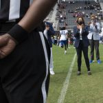 
              Vice President Kamala Harris stands on the field before an NCAA college football game between Howard and Hampton at Audi Field in Washington, Saturday, Sept. 18, 2021. Harris attended Howard University and graduated in 1986. (AP Photo/Cliff Owen)
            