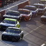 
              Kurt Busch (1) leads Ryan Blaney (12) after the first yellow flag during a NASCAR Cup Series auto race Sunday, Sept. 5, 2021, in Darlington, S.C. (AP Photo/John Amis)
            