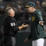 
              Oakland Athletics manager Bob Melvin, right, reacts after being ejected by umpire Greg Gibson (53) during the sixth inning of a baseball game between the Athletics and the Seattle Mariners in Oakland, Calif., Wednesday, Sept. 22, 2021. (AP Photo/Jeff Chiu)
            