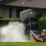 
              Phil Mickelson follow his shot out of a bunker up to the second green of the Silverado Resort North Course during the final round of the Fortinet Championship PGA golf tournament Sunday, Sept. 19, 2021, in Napa, Calif. (AP Photo/Eric Risberg)
            