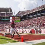 
              Alabama running back Jase McClellan (21) returns a blocked punt for a touchdown against Mercer during the first half of an NCAA college football game, Saturday, Sept. 11, 2021, in Tuscaloosa, Ala. (AP Photo/Vasha Hunt)
            