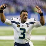 
              Seattle Seahawks quarterback Russell Wilson (3) waves to fans as he leaves the field following a 28-16 win over the Indianapolis Colts in an NFL football game in Indianapolis, Sunday, Sept. 12, 2021. (AP Photo/Charlie Neibergall)
            