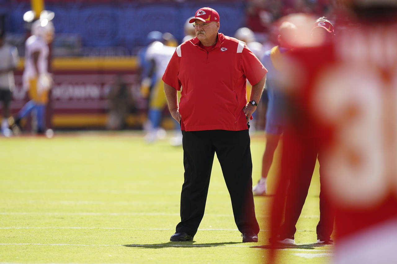 Kansas City Chiefs head coach Andy Reid watches as the teams warms-up before an NFL football game b...