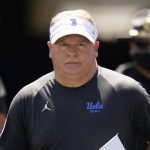 
              UCLA head coach Chip Kelly walks on to the field before an NCAA college football game against Hawaii Saturday, Aug. 28, 2021, in Pasadena, Calif. (AP Photo/Ashley Landis)
            