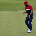 
              Team USA's Dustin Johnson reacts to his putt on the 17th hole during a Ryder Cup singles match at the Whistling Straits Golf Course Sunday, Sept. 26, 2021, in Sheboygan, Wis. (AP Photo/Ashley Landis)
            