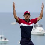 
              Team USA's Collin Morikawa reacts after winning the 17th hole during a Ryder Cup singles match at the Whistling Straits Golf Course Sunday, Sept. 26, 2021, in Sheboygan, Wis. (AP Photo/Ashley Landis)
            