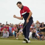 
              Team USA's Patrick Cantlay makes a putt on the 15th hole during a Ryder Cup singles match at the Whistling Straits Golf Course Sunday, Sept. 26, 2021, in Sheboygan, Wis. (AP Photo/Charlie Neibergall)
            