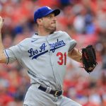 
              Los Angeles Dodgers' Max Scherzer throws during the sixth inning of a baseball game against the Cincinnati Reds in Cincinnati, Saturday, Sept. 18, 2021. (AP Photo/Aaron Doster)
            