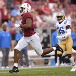 
              Stanford wide receiver Elijah Higgins (6) runs for a touchdown after making the catch against the UCLA during the second half of an NCAA college football game Saturday, Sept. 25, 2021, in Stanford, Calif. (AP Photo/Tony Avelar)
            
