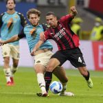 
              Venezia's Tanner Tessmann, left, challenges for the ball with AC Milan's Ismael Bennacer during the Serie A soccer match between AC Milan and Venezia at the San Siro stadium, in Milan, Italy, Wednesday, Sept. 22, 2021. Italian soccer team Venezia is back in the top division for the first time since 2002. And it has tapped Major League Soccer to recruit young Americans in its bid to stay afloat in Serie A. Nineteen-year-old Gianluca Busio arrived in Venice from Sporting Kansas City and 20-year-old Tanner Tessmann from FC Dallas. (AP Photo/Antonio Calanni)
            