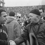 
              FILE - In this Nov. 19, 1966, file photo, Notre Dame football coach Ara Parseghian, left, shakes hands with Michigan State coach Duffy Daugherty after their 10-10 tie in East Lansing, Mich. The game was a slog, most memorable for Irish coach Ara Parseghian playing it safe at the end without his injured starting quarterback and settling for a tie. (AP Photo/File)
            