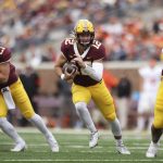 
              Minnesota quarterback Cole Kramer (12) runs with the ball during the second half of an NCAA college football game against Bowling Green, Saturday, Sept. 25, 2021, in Minneapolis. Bowling Green won 14-10. (AP Photo/Stacy Bengs)
            