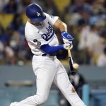 
              Los Angeles Dodgers' Trea Turner connects for a solo home run during the fifth inning of the team's baseball game against the Arizona Diamondbacks on Tuesday, Sept. 14, 2021, in Los Angeles. (AP Photo/Marcio Jose Sanchez)
            