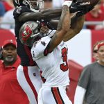 
              Tampa Bay Buccaneers safety Antoine Winfield Jr. (31) knocks a pass away from Atlanta Falcons wide receiver Calvin Ridley (18) during the first half of an NFL football game Sunday, Sept. 19, 2021, in Tampa, Fla. (AP Photo/Jason Behnken)
            