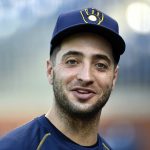 
              FILE - In this June 2, 2016, file photo, Milwaukee Brewers left fielder Ryan Braun smiles during warm ups for a baseball game against the Philadelphia Phillies in Philadelphia. Braun, the Brewers' home run leader whose production was slowed by injuries during the second half of his 14-year career, announced his retirement on Tuesday, Sept. 14, 2021. Braun hasn’t played all season and said during spring training that he was leaning toward retirement. (AP Photo/Derik Hamilton, File)
            