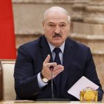 
              Belarusian President Alexander Lukashenko gestures as he speaks during an expanded meeting of the Constitutional Commission in Minsk, Belarus, Tuesday, Sept. 28, 2021. The authoritarian leader of Belarus announced a referendum on a new constitution in Feb. 2022 and promised not to let the opposition come to power. Alexander Lukashenko told a government meeting Tuesday he had drafted a new constitution that redistributes powers between the main branches of the government and establishes a new governing body, the All-Belarus People's Assembly. (Maxim Guchek/BelTA photo via AP)
            