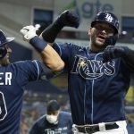 
              Tampa Bay Rays' Mike Zunino, right, celebrates with Kevin Kiermaier after hitting a two-run home run against the Detroit Tigers during the sixth inning of a baseball game Thursday, Sept. 16, 2021, in St. Petersburg, Fla. (AP Photo/Scott Audette)
            