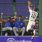 
              Pittsburgh Pirates center fielder Bryan Reynolds (10) can't make the catch in front of the Chicago Cubs bullpen on a double to deep left-center field by Chicago Cubs' Frank Schwindel during the second inning of a baseball game in Pittsburgh, Wednesday, Sept. 29, 2021. (AP Photo/Gene J. Puskar)
            