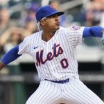 
              New York Mets' Marcus Stroman (0) pitches during the first inning in the first baseball game of a doubleheader against the Miami Marlins, Tuesday, Sept. 28, 2021, in New York. (AP Photo/Frank Franklin II)
            
