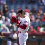 
              Los Angeles Angels starting pitcher Shohei Ohtani, of Japan, adjusts his hat after giving up a home run against Oakland Athletics' Yan Gomes, not pictured, during the third inning of a baseball game Sunday, Sept. 19, 2021, in Anaheim, Calif. (AP Photo/Jae C. Hong)
            