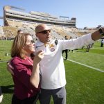 
              Minnesota head coach P.J. Fleck points to fans as he is congratulated after the second half of an NCAA college football game against Colorado, Saturday, Sept. 18, 2021, in Boulder, Colo. Minnesota won 30-0. (AP Photo/David Zalubowski)
            
