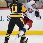 
              Pittsburgh Penguins' Brian Boyle (11) collides with Columbus Blue Jackets' Andrew Peeke during the first period of an NHL exhibition hockey game in Pittsburgh, Monday, Sept. 27, 2021. (AP Photo/Gene J. Puskar)
            