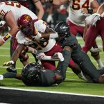 
              Iowa State running back Breece Hall (28) is tackled by UNLV linebacker Jacoby Windmon, right, near the goal line during the first half of an NCAA college football game Saturday, Sept. 18, 2021, in Las Vegas. (AP Photo/John Locher)
            