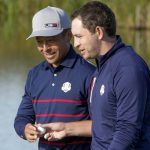 
              Team USA's Scottie Scheffler talks to Team USA's Patrick Cantlay during a foursome match the Ryder Cup at the Whistling Straits Golf Course Friday, Sept. 24, 2021, in Sheboygan, Wis. (AP Photo/Charlie Neibergall)
            