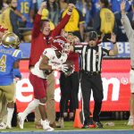 
              Fresno State wide receiver Erik Brooks (3) makes a touchdown catch next to UCLA defensive back Stephan Blaylock (4) during the second half of an NCAA college football game Sunday, Sept. 19, 2021, in Pasadena, Calif. (AP Photo/Marcio Jose Sanchez)
            