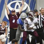 
              Mississippi State wide receiver Jaden Walley (11) catches a pass in the end zone to score as Memphis defensive back Tyrez Lindsey defends during the first half of an NCAA college football game on Saturday, Sept. 18, 2021, in Memphis, Tenn. (AP Photo/John Amis)
            