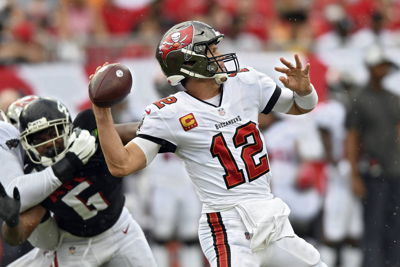 Tampa Bay Buccaneers quarterback Tom Brady (12) fires a pass against the Atlanta Falcons during the...