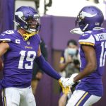 
              Minnesota Vikings wide receiver Adam Thielen (19) celebrates touchdown against the Seattle Seahawks with wide receiver Dede Westbrook (12) in the first half of an NFL football game in Minneapolis, Sunday, Sept. 26, 2021. (AP Photo/Bruce Kluckhohn)
            