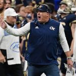 
              Georgia Tech head coach Geoff Collins yells to his players on the field during the first half of an NCAA college football game against North Carolina Saturday, Sept. 25, 2021, in Atlanta. (AP Photo/John Bazemore)
            