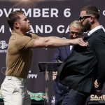 
              Unified WBC/WBO/WBA super middleweight champion Canelo Alvarez, left, shoves undefeated IBF Super Middleweight Champion Caleb Plant during a news conference Tuesday, Sept. 21, 2021, in Beverly Hills, Calif., to announce their 168-pound title bout. The fight is scheduled for Saturday, Nov. 6 in Las Vegas. (AP Photo/Mark J. Terrill)
            