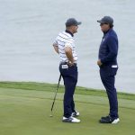 
              Team USA's Bryson DeChambeau talks to Phil Mickelson on the third hole during a practice day at the Ryder Cup at the Whistling Straits Golf Course Tuesday, Sept. 21, 2021, in Sheboygan, Wis. (AP Photo/Charlie Neibergall)
            