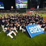 
              The Atlanta Braves pose for a team photo after they Clinched the NL East title against the Philadelphia Phillies, Thursday, Sept. 30, 2021, in Atlanta. (AP Photo/John Bazemore)
            
