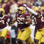 
              Minnesota linebacker Mariano Sori-Marin (55) celebrates with teammates after intercepting the ball against Bowling Green during an NCAA college football game Saturday, Sept. 25, 2021, in Minneapolis. (AP Photo/Stacy Bengs)
            