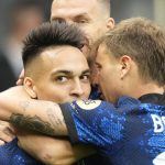 
              Inter Milan's Lautaro Martinez celebrates with teammates after scoring his side's first goal during an Italian Serie A soccer match between Inter Milan and Atalanta, at the San Siro stadium in Milan, Italy, Saturday, Sept. 25, 2021. (AP Photo/Luca Bruno)
            