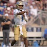 
              UCLA quarterback Dorian Thompson-Robinson (1) throws a pass against the Stanford during the first half of an NCAA college football game Saturday, Sept. 25, 2021, in Stanford, Calif. (AP Photo/Tony Avelar)
            