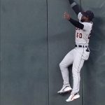 
              Detroit Tigers center fielder Akil Baddoo makes a futile leap for the ball on a three-run home run by Minnesota Twins' Jorge Polanco off Tigers pitcher Casey Mize in the first inning of a baseball game, Wednesday, Sept. 29, 2021, in Minneapolis. (Photo by Jim Mone)
            