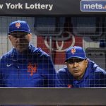 
              New York Mets manager Luis Rojas, right, watches his team play during the first inning of a baseball game against the Miami Marlins, Thursday, Sept. 30, 2021, in New York. (AP Photo/Frank Franklin II)
            