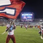 
              Jacksonville State wide receiver Michael Pettway (2) waves a flag on the field after the team's 20-17 win over Florida State in an NCAA college football game Saturday, Sept. 11, 2021, in Tallahassee, Fla. (AP Photo/Phil Sears)
            