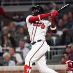 
              Atlanta Braves' Jorge Soler, left, hits a solo home run in the first inning of a baseball game against the Philadelphia Phillies, Thursday, Sept. 30, 2021, in Atlanta. (AP Photo/John Bazemore)
            