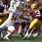 
              Minnesota running back Treyson Potts (3) avoids a tackle by Bowling Green linebacker Brock Horne (34) during the second half of an NCAA college football game Saturday, Sept. 25, 2021, in Minneapolis. Bowling Green won 14-10. (AP Photo/Stacy Bengs)
            