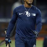 
              Tampa Bay Rays' Wander Franco carries his bats after taking batting practice before a baseball game against the Toronto Blue Jays Monday, Sept. 20, 2021, in St. Petersburg, Fla. Franco expects to rejoin the team next week after injuring his hamstring. (AP Photo/Chris O'Meara)
            