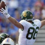 
              Baylor tight end Ben Sims (86) celebrates a touchdown during the first half of an NCAA college football game against Kansas in Lawrence, Kan., Saturday, Sept. 18 2021. (AP Photo/Orlin Wagner)
            